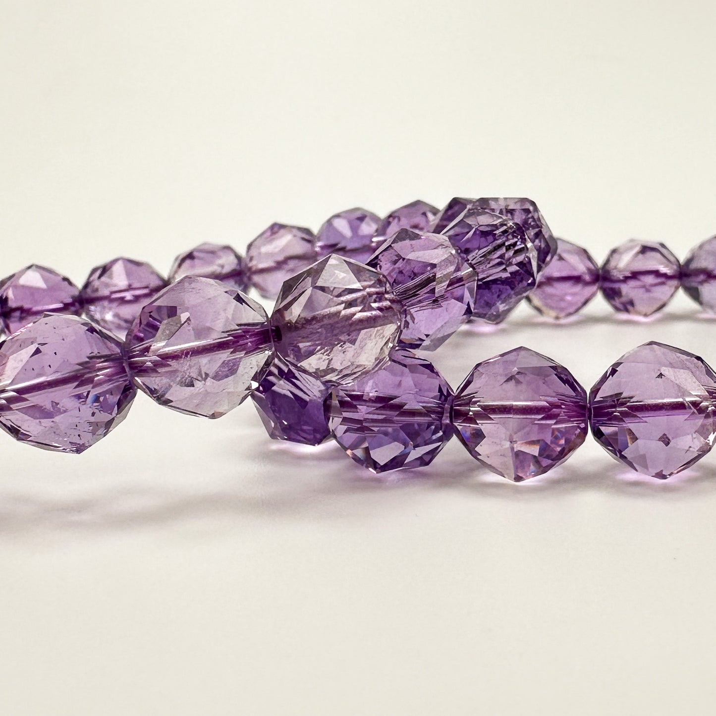 Amethyst 10mm Faceted Star Cut Stretchy Cord Bracelet (J292)