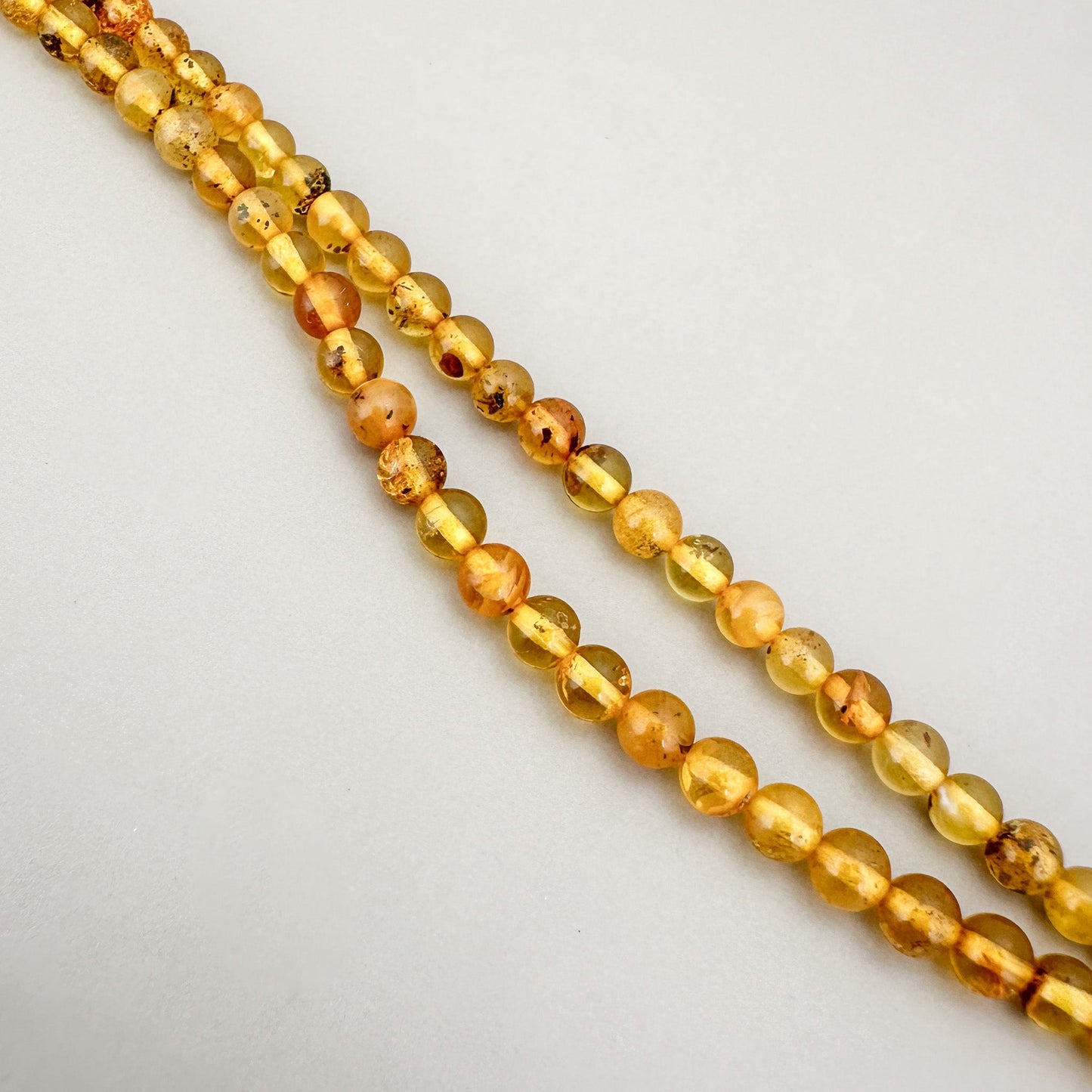 Amber 4mm Smooth Round Bead - (2 Lengths) (GEM2241)