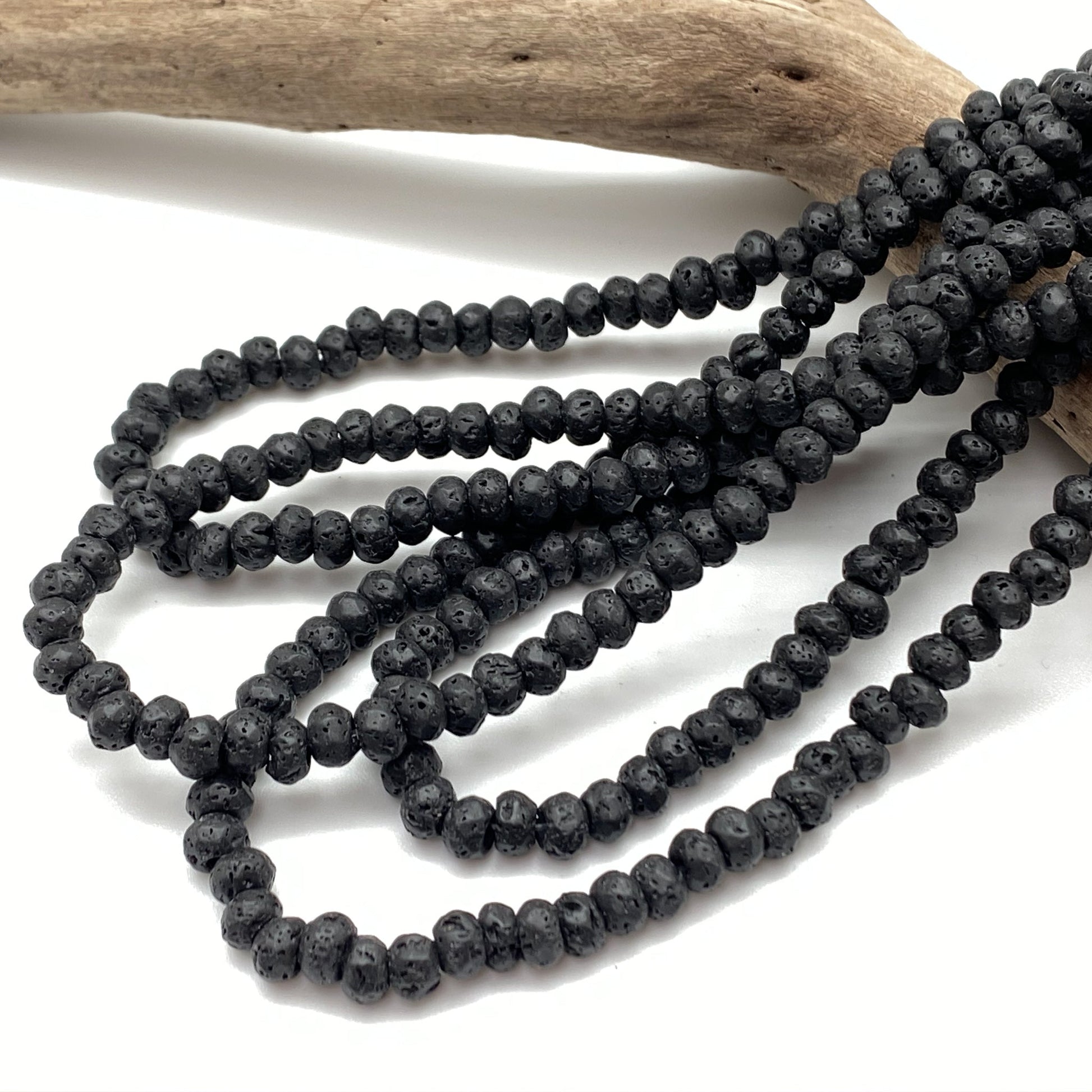 Black Lava 8mm Rondelle w/ Large Hole Bead - 16" Strand