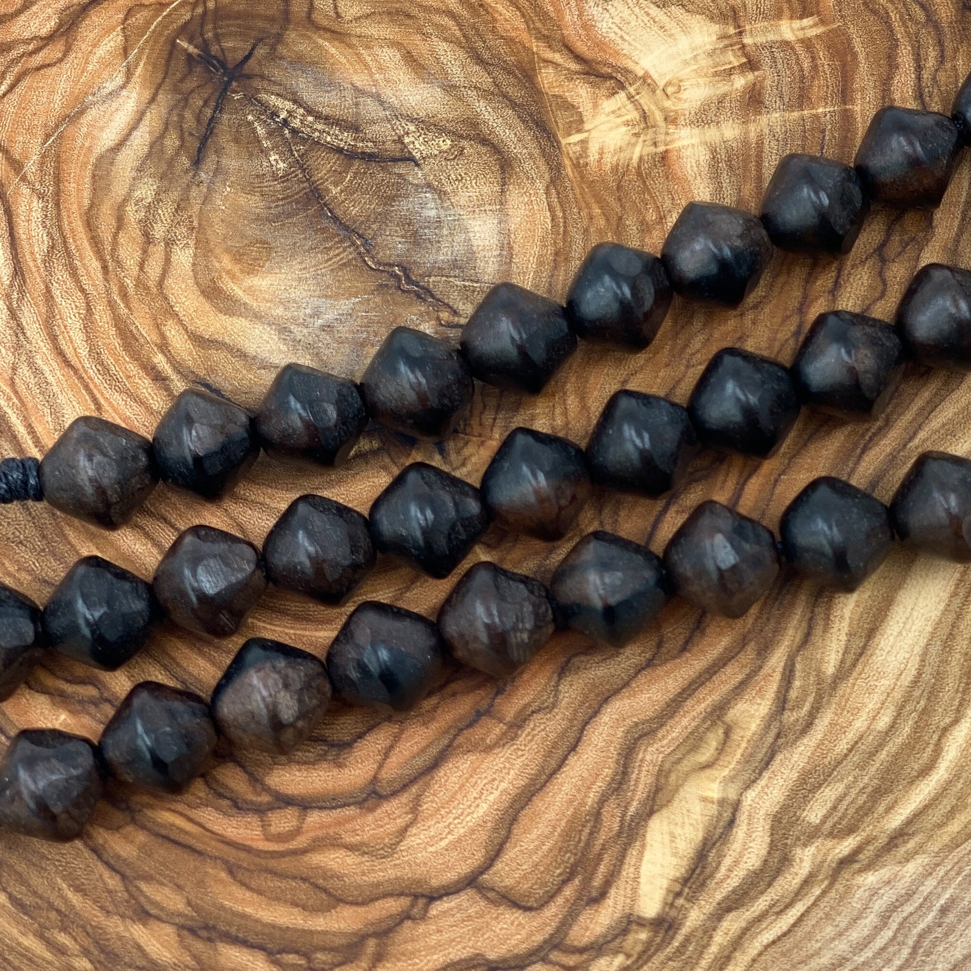 Faceted Tiger Ebony Wood Strand - 10mm Bicone