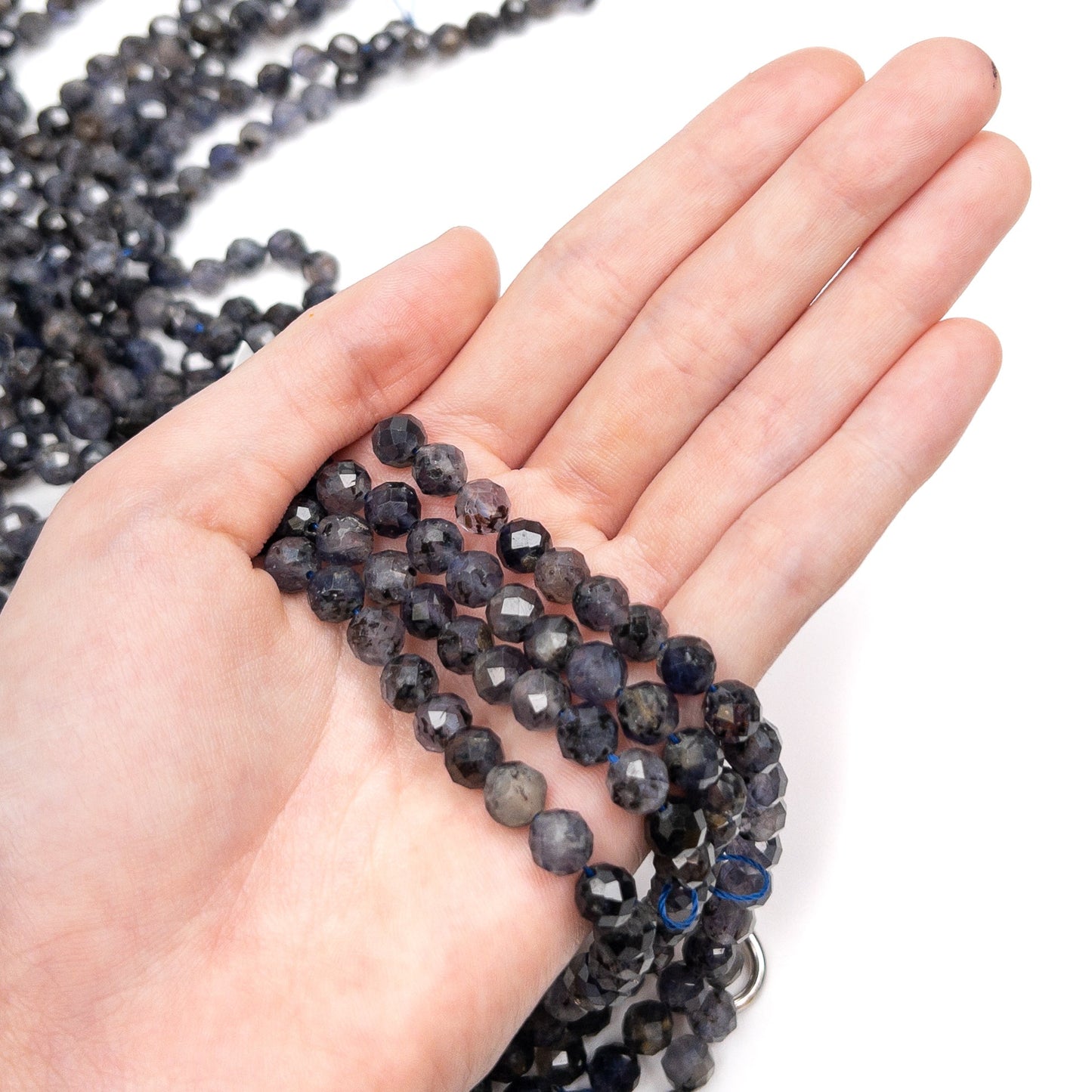 Iolite 6.5mm Faceted Round Bead - 8" Strand