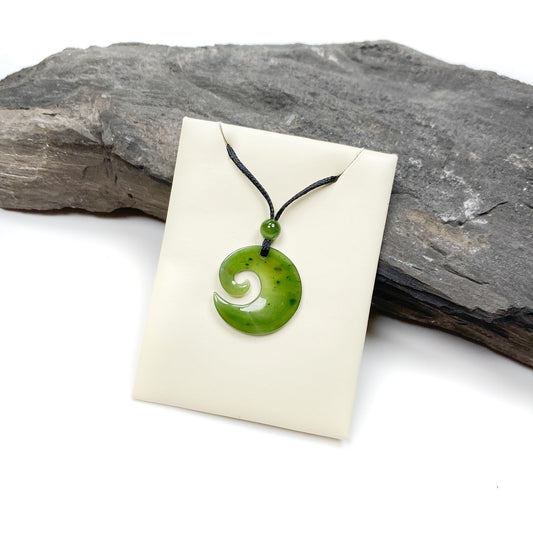 Spiral Wave Carved Canadian Jade Cord Necklace