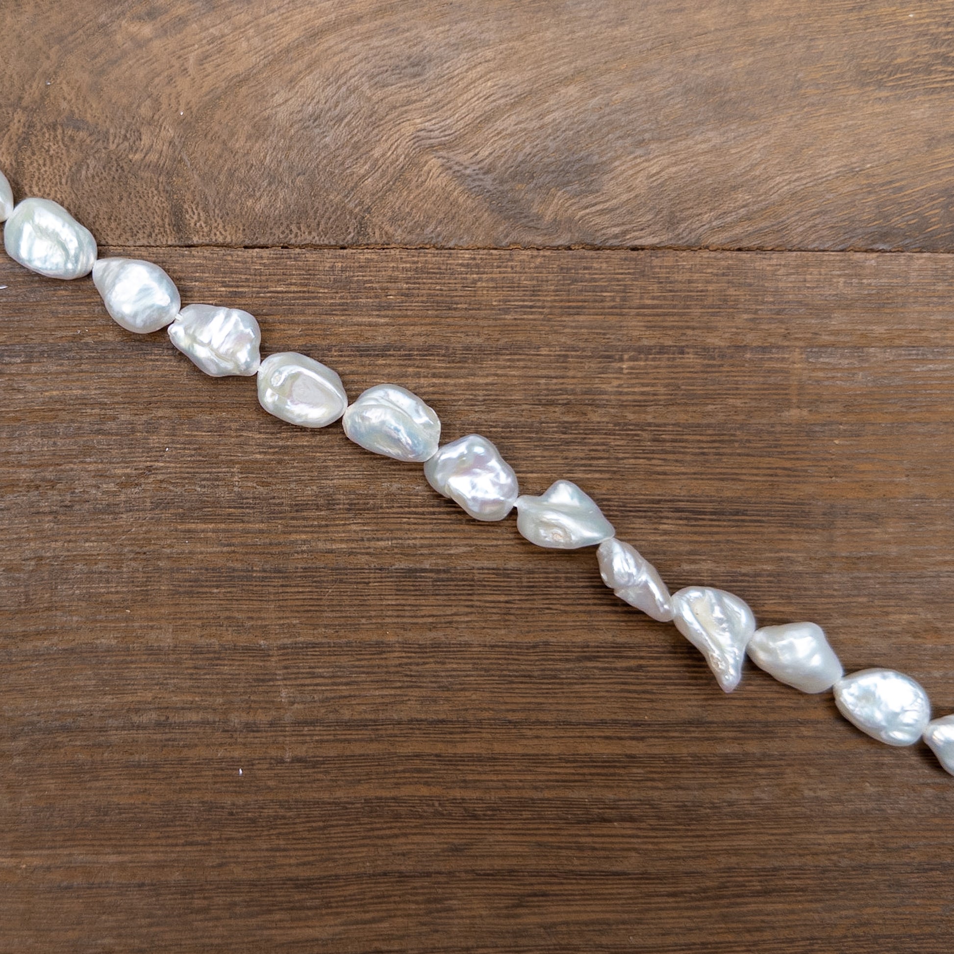 Natural White 12x10mm Long-Drilled Biwa Freshwater Pearl Bead - 7.25" Strand